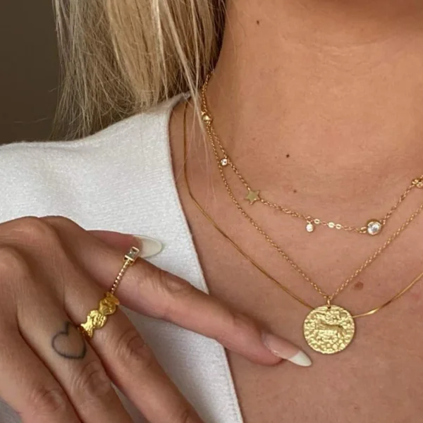 How to Layer Necklaces, Bracelets, and Rings Without Overdoing It